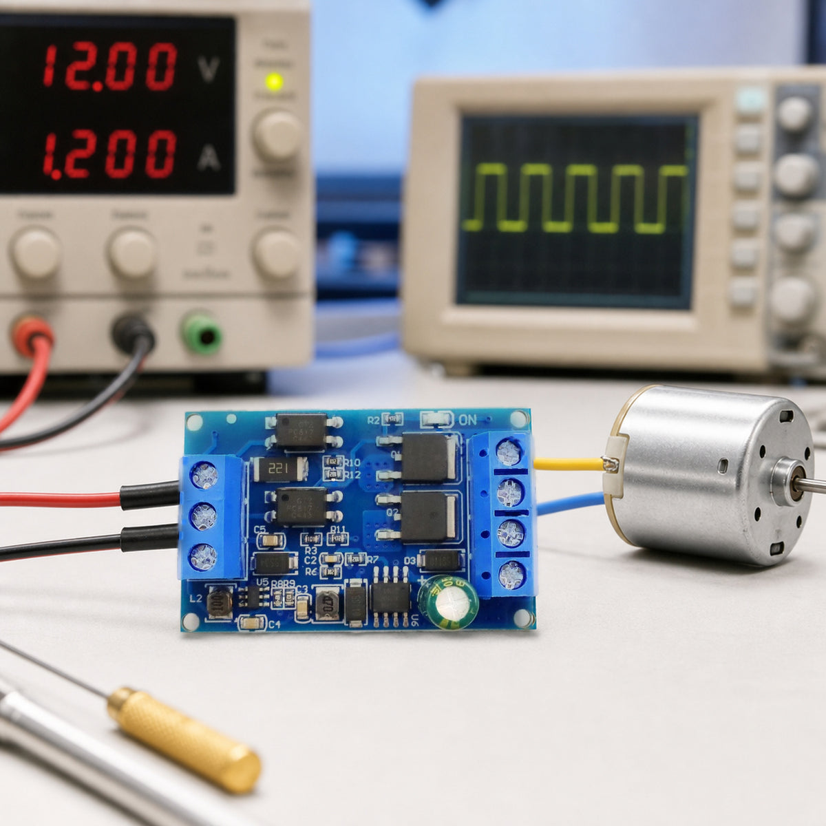 MOSFET PWM switch module – the module on a workbench wired to a small 12V DC motor and a bench power supply