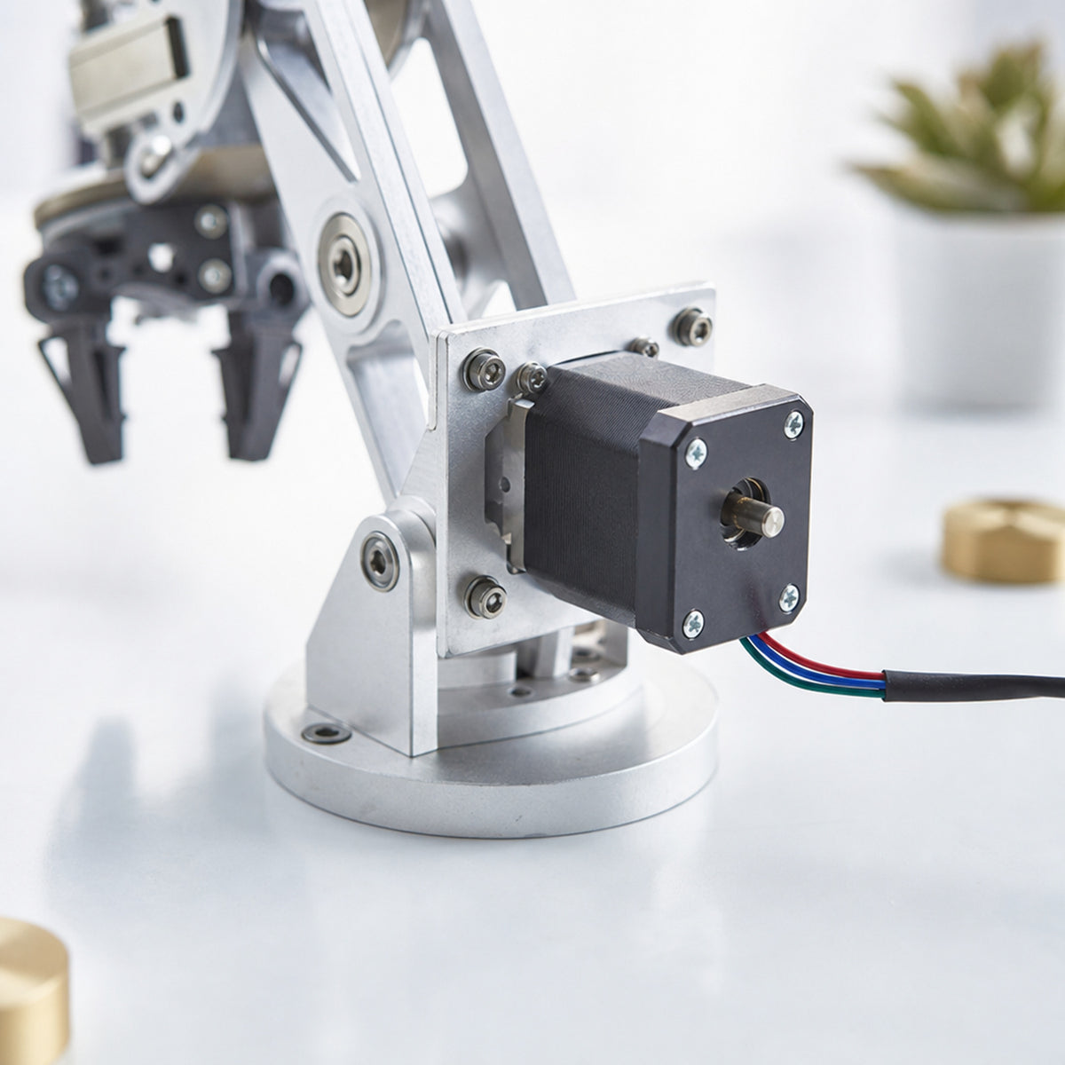NEMA 17 stepper motor – the stepper motor bolted with an aluminium bracket onto a small robot arm prototype