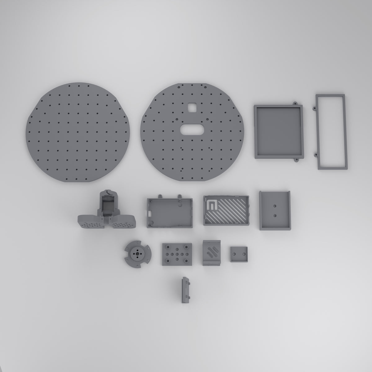 LeKiwi mobile base 3D-printed parts set laid out: two base plates, wheel hubs, motor mounts, Pi case, battery mount, printed in Singapore in PLA+